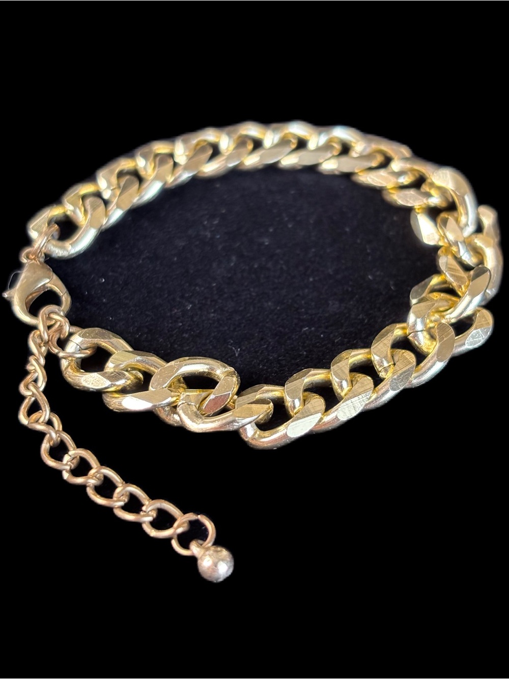 Polished Gold-Tone Cuban Link Bracelet with Adjustable Chain